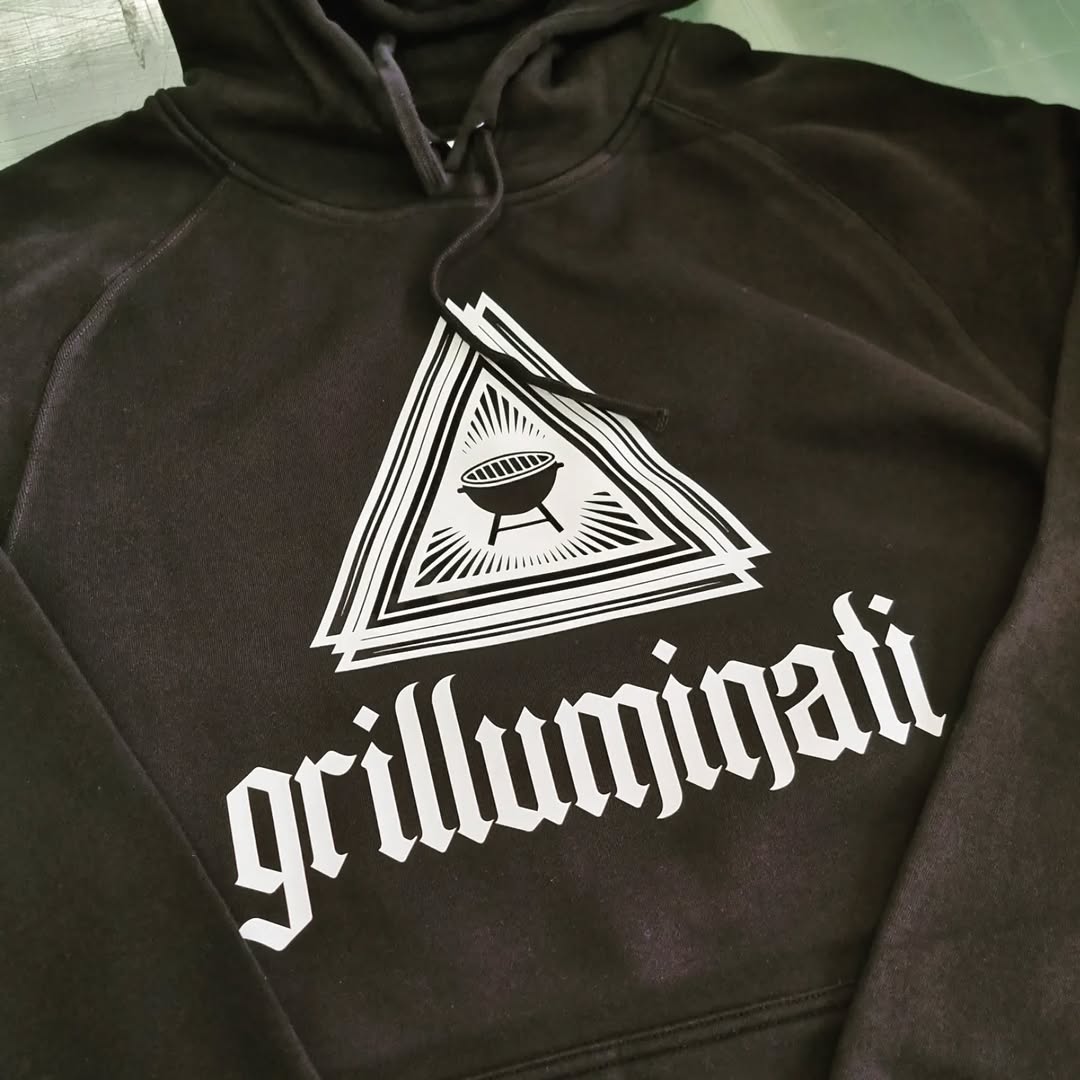 Black custom hoodie with a large screen printed graphic by Creative Design and Print in Auckland