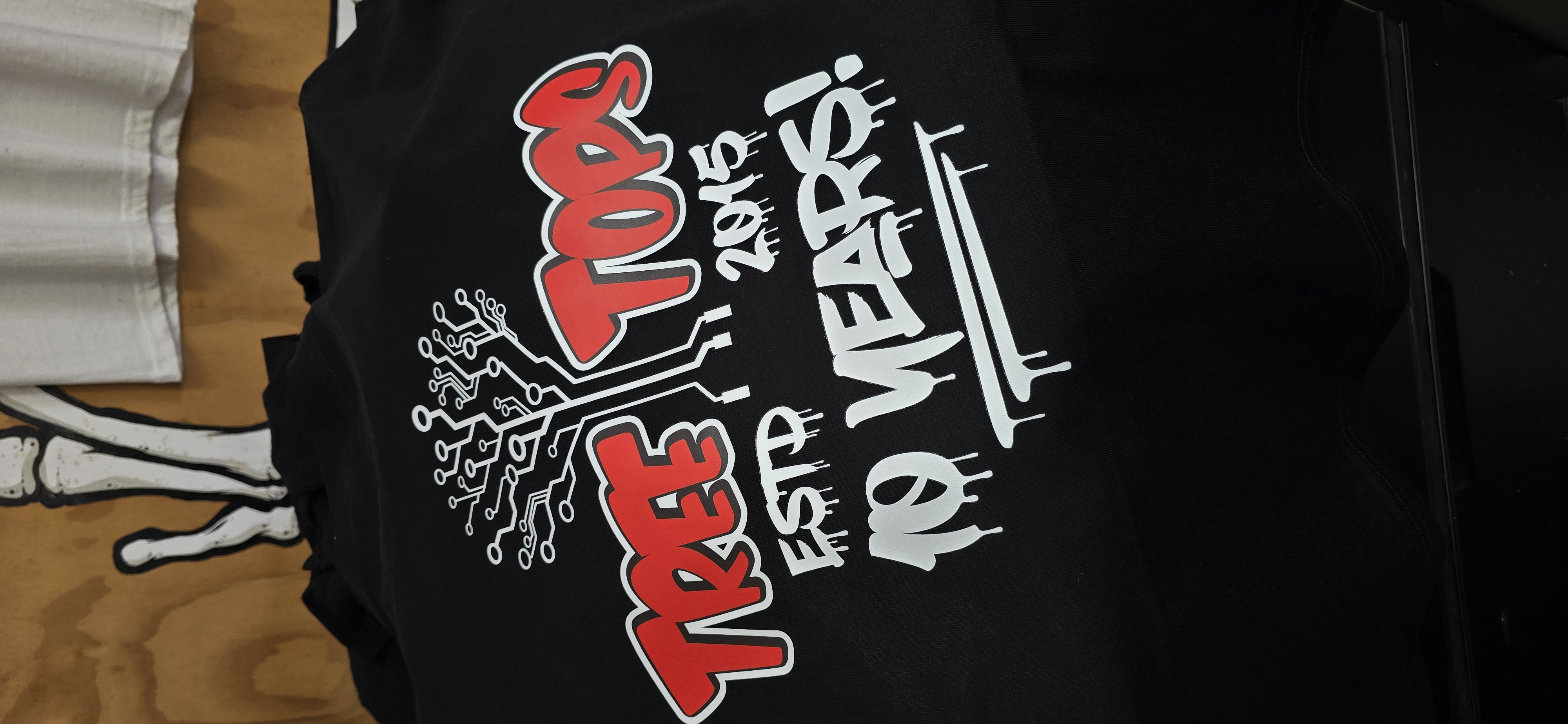 Custom Tree Tops anniversary hoodie for a community group