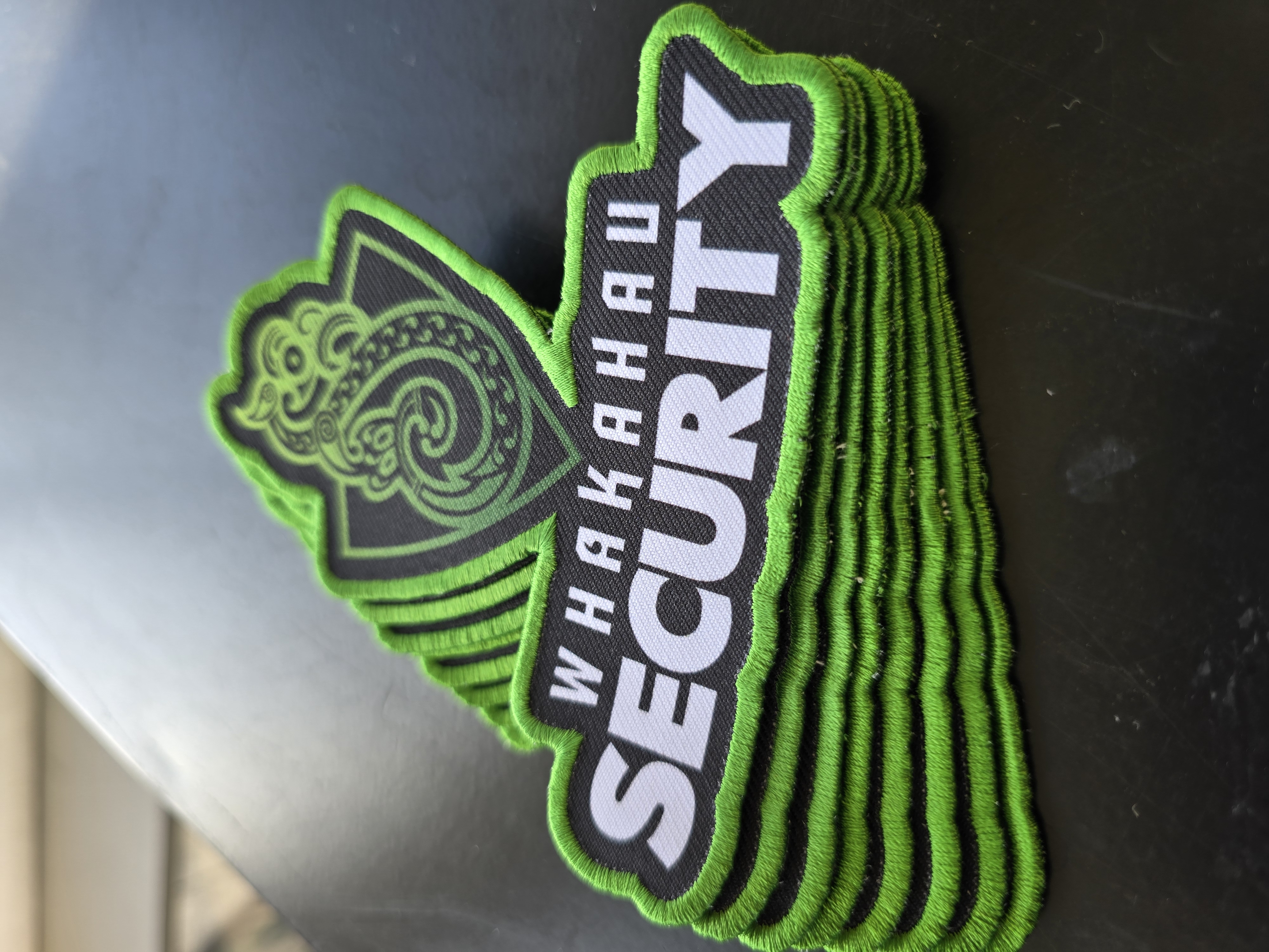 Embroidered logo close-up showing thread detail