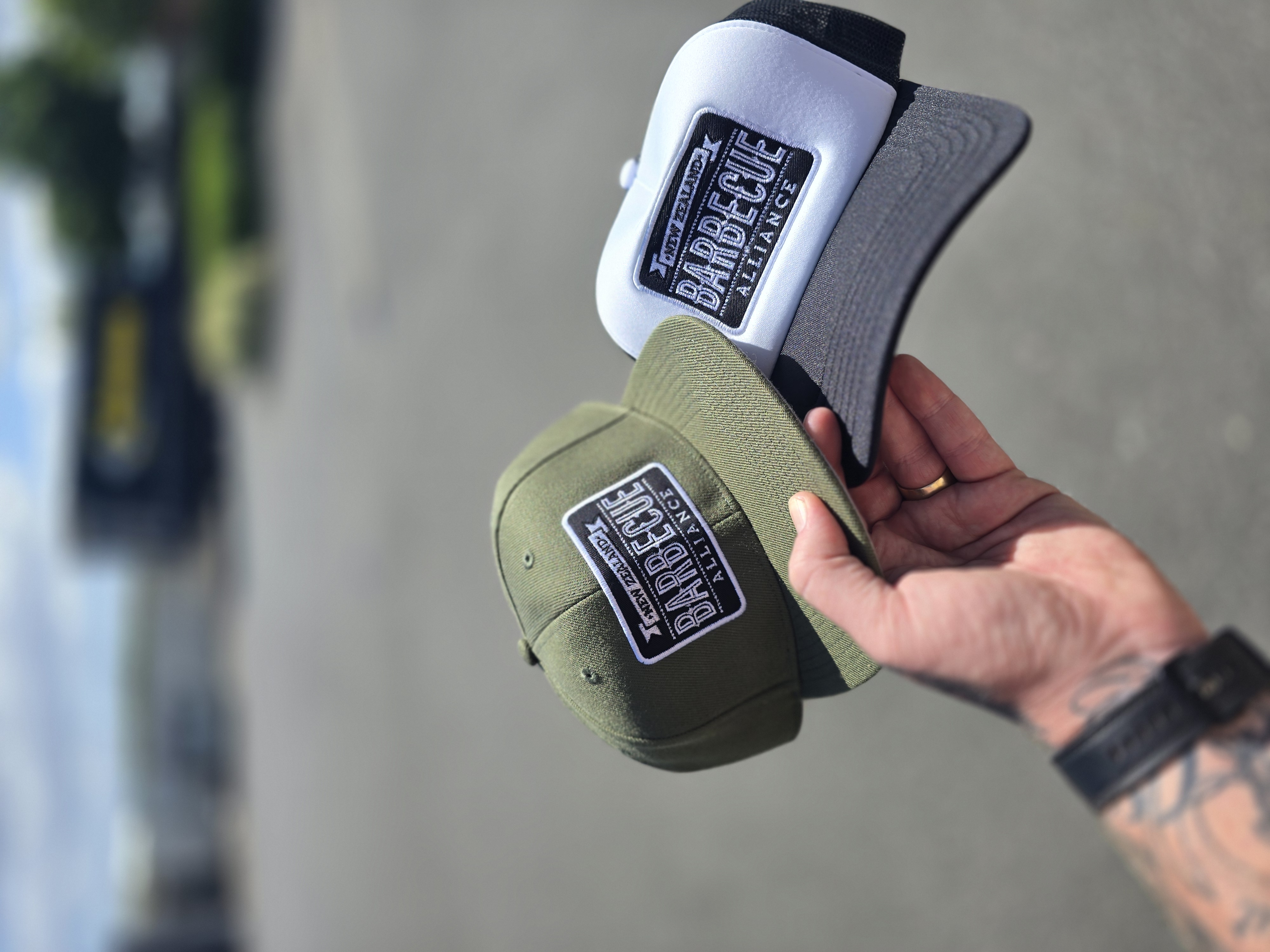 Embroidered caps and polos at the CDP Henderson studio